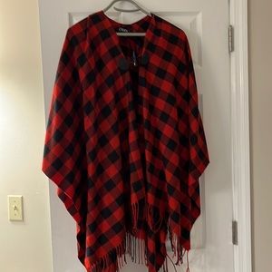 Black and red Chaps poncho with closure. It doesn’t have a size indicated.